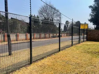 Clear View fence along a suburban road