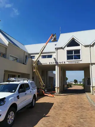 Estate entrance with a bakkie on site during installation