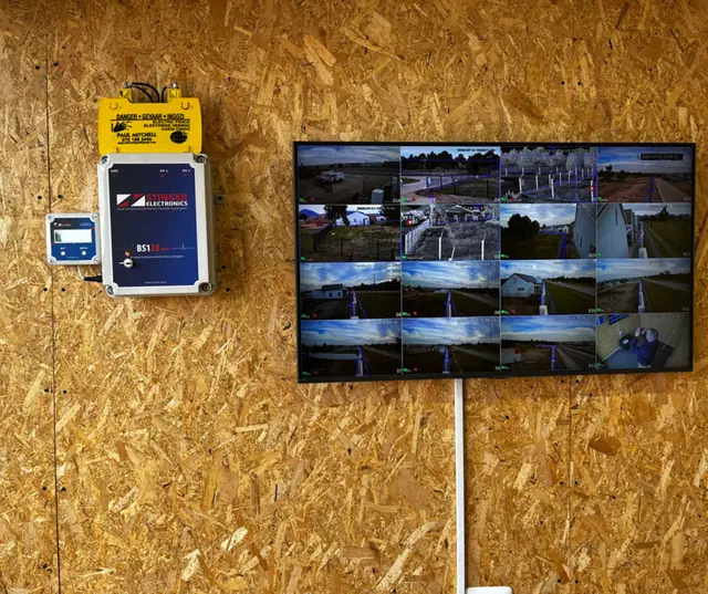 CCTV monitor showing multiple camera feeds beside the control equipment