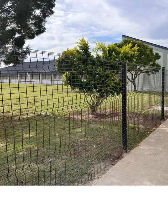 Clear View mesh fence along a lawn