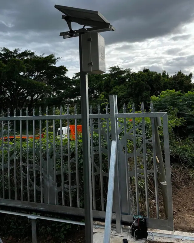 Gate motor installation on a steel palisade sliding gate